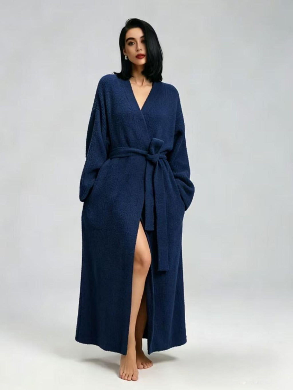 Woman in a royal blue long fleece robe