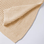 Close-up of the soft ribbed cotton knit and side slit hem