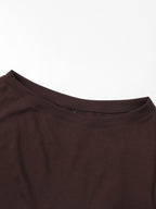 Close-up of the soft neckline on the off-shoulder sweatshirt
