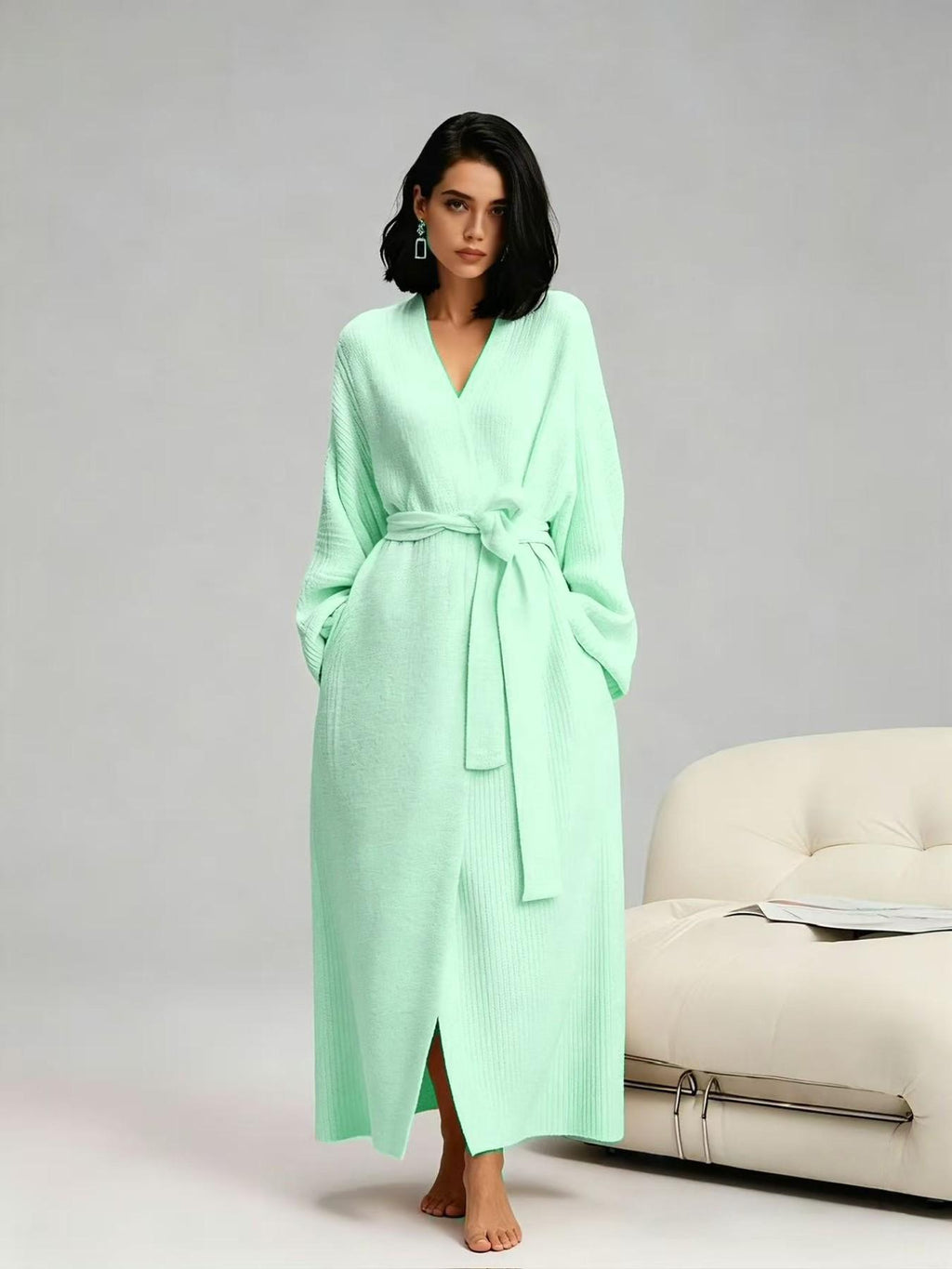 Woman in a light green long plush robe