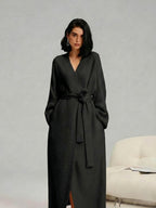 Woman in a black long fleece robe