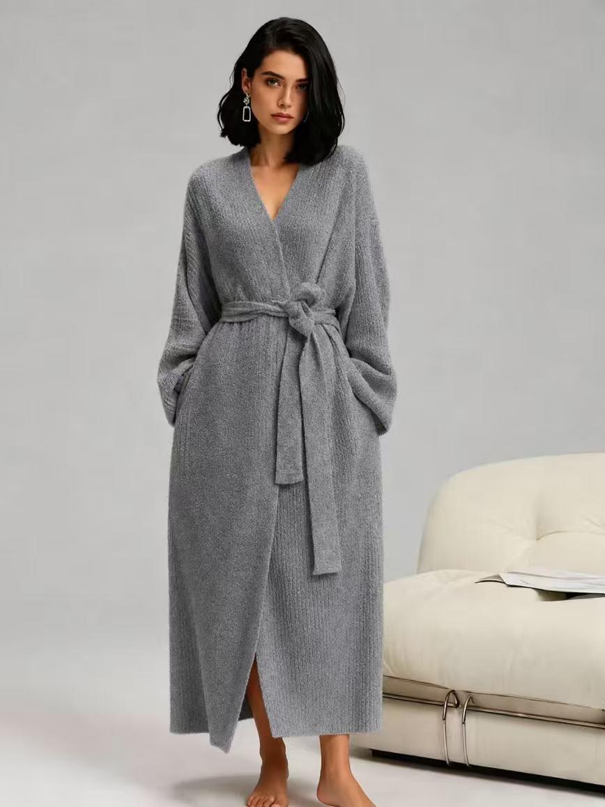 Woman in a silver gray long plush robe