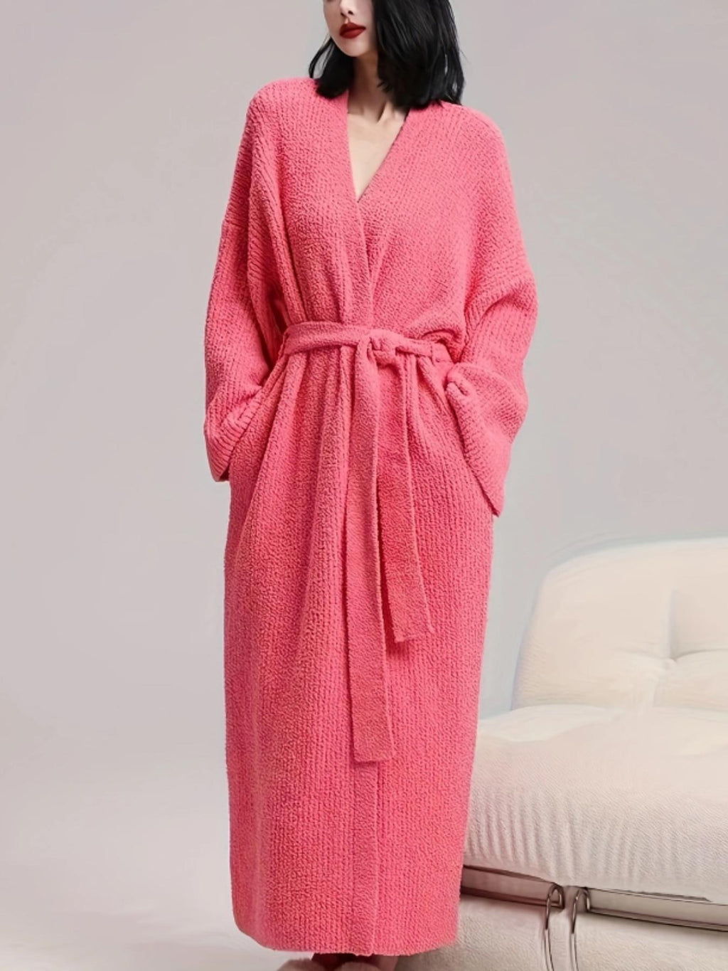 Woman in a hot pink long fleece robe