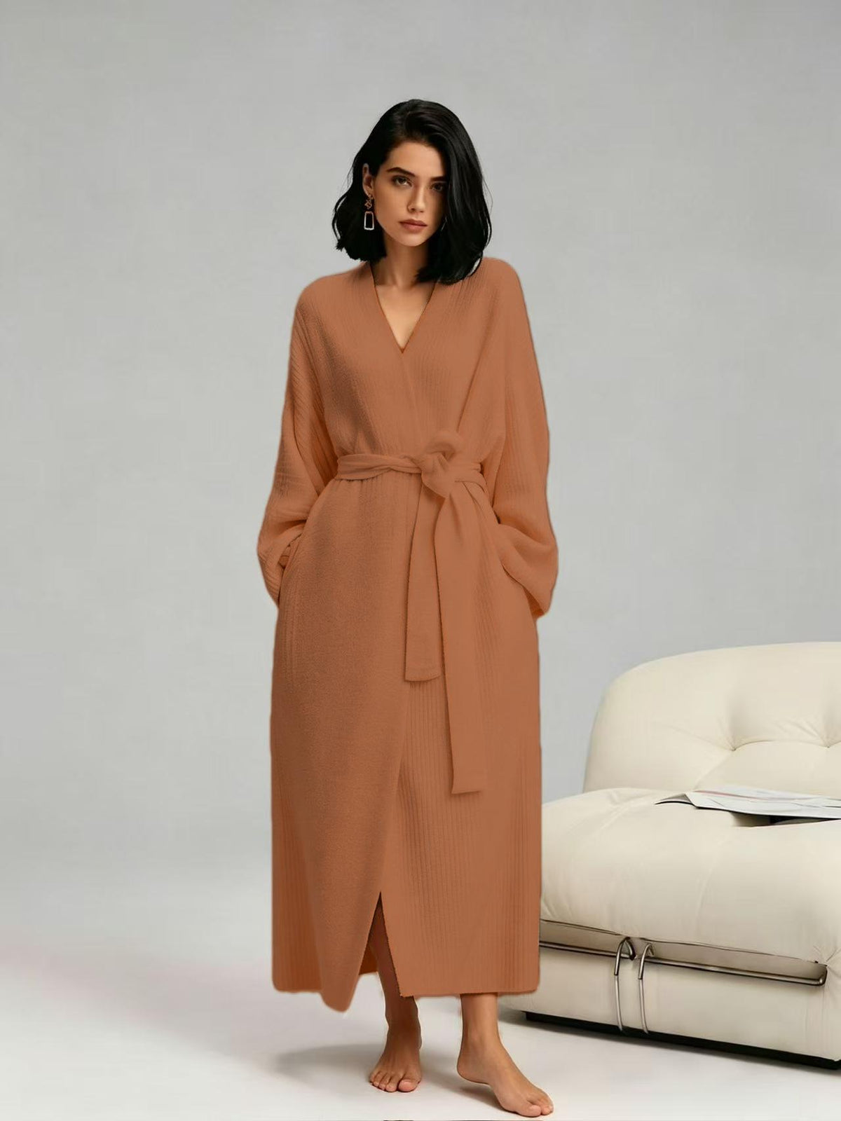 Woman in a fawn brown long fleece robe