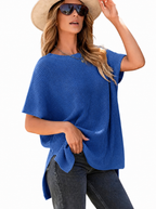 Woman in a blue oversized puff short sleeve ribbed knit top
