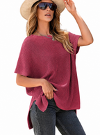 Woman in a rose red oversized puff short sleeve ribbed knit top