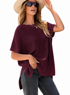Woman in a burgundy oversized puff short sleeve ribbed knit top