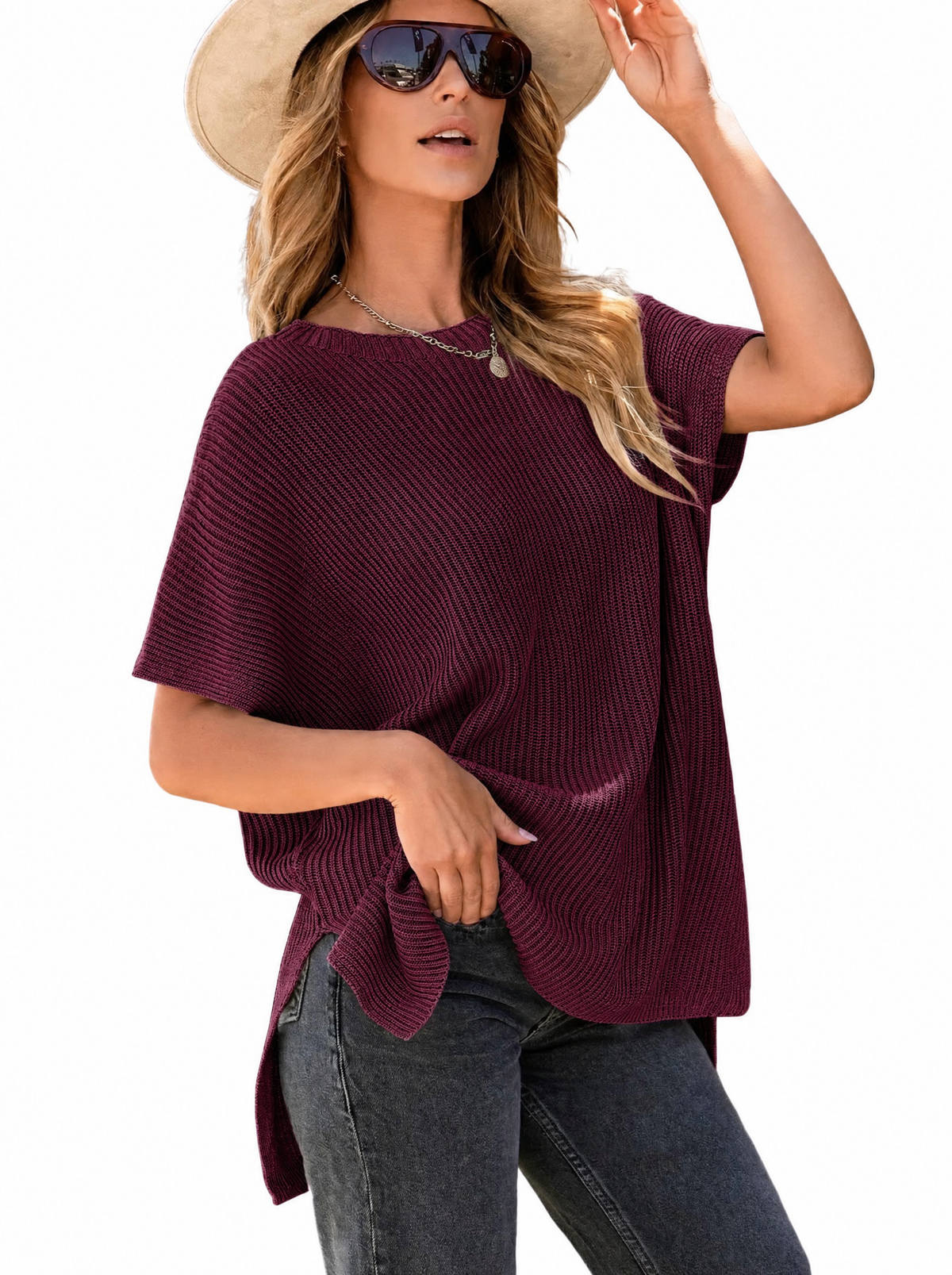 Woman in a burgundy oversized puff short sleeve ribbed knit top