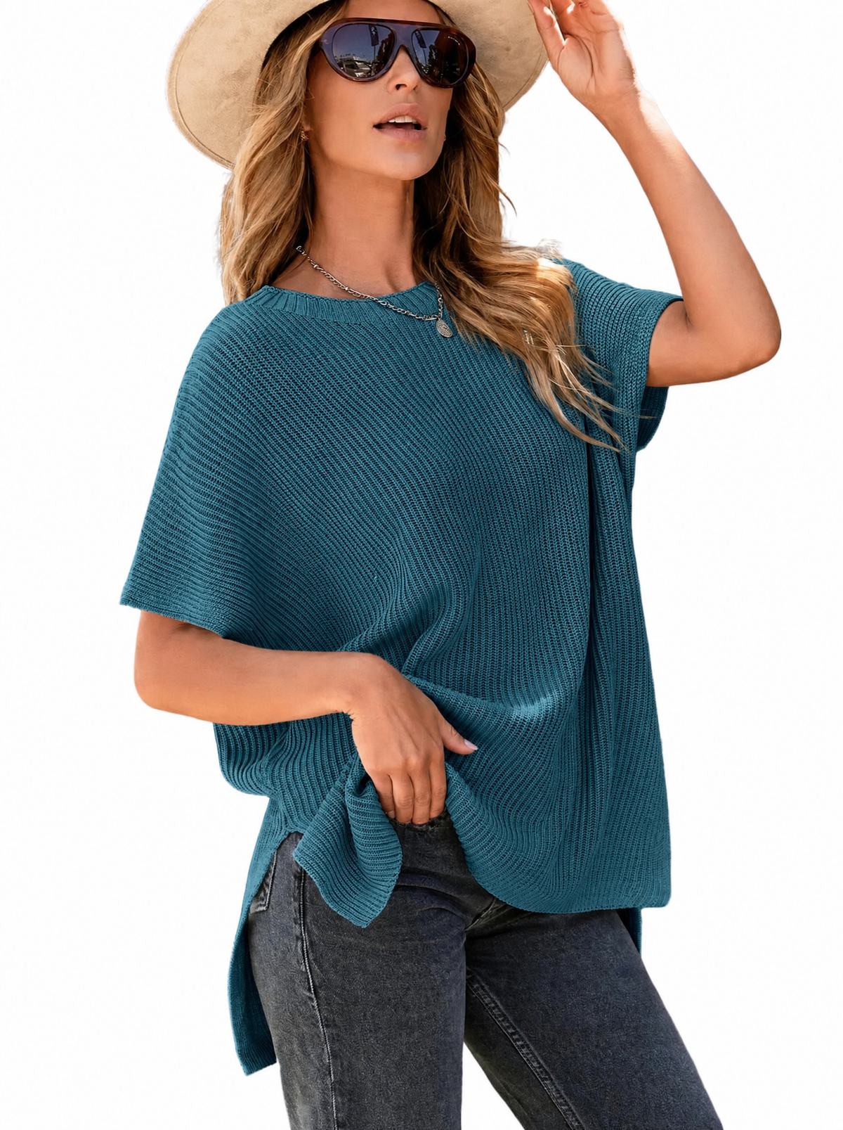 Woman in a real teal oversized puff short sleeve ribbed knit top