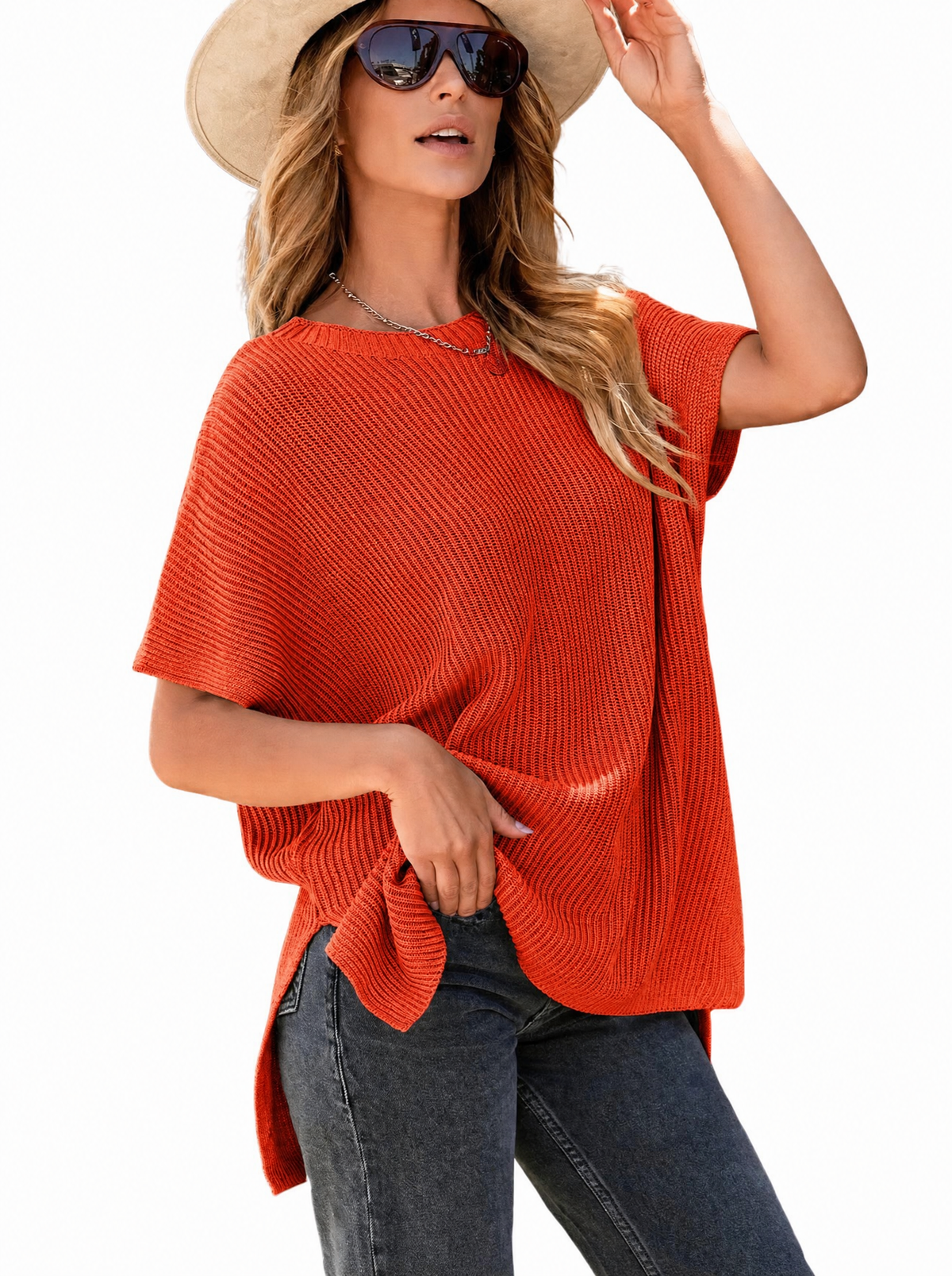 Woman in a fiery red oversized puff short sleeve ribbed knit top